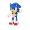 Blue and beige Sonic the Hedgehog figure with green eyes and red boots made from building block plastic bricks