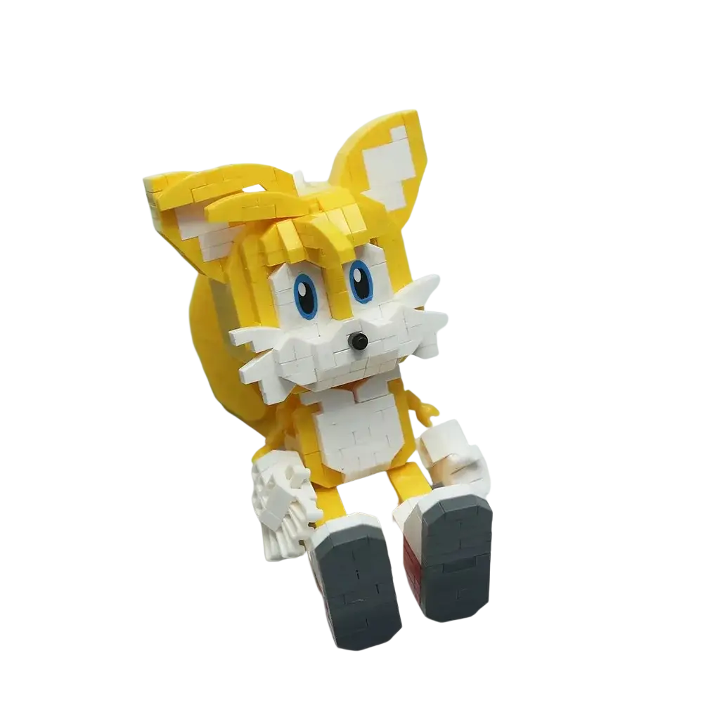 Sonic small building blocks pixel figure toy featuring yellow and white tails with blue eyes and gray shoes with red accents