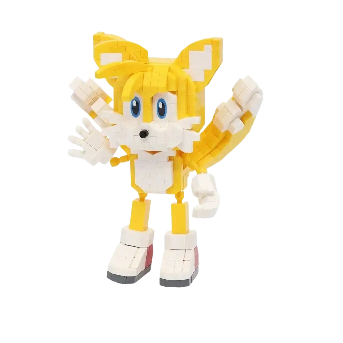 Sonic small building blocks figure with yellow and white pixelated tails, blue eyes, black nose, and red boots, 13.1cm tall