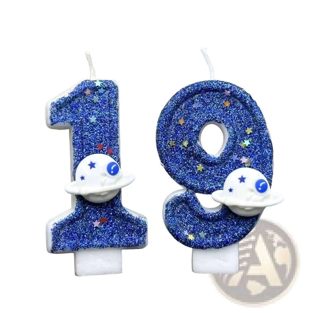 Blue glittery number candles shaped like 1 and 9 with white spaceship figurines featuring blue eyes for space birthday cake topper