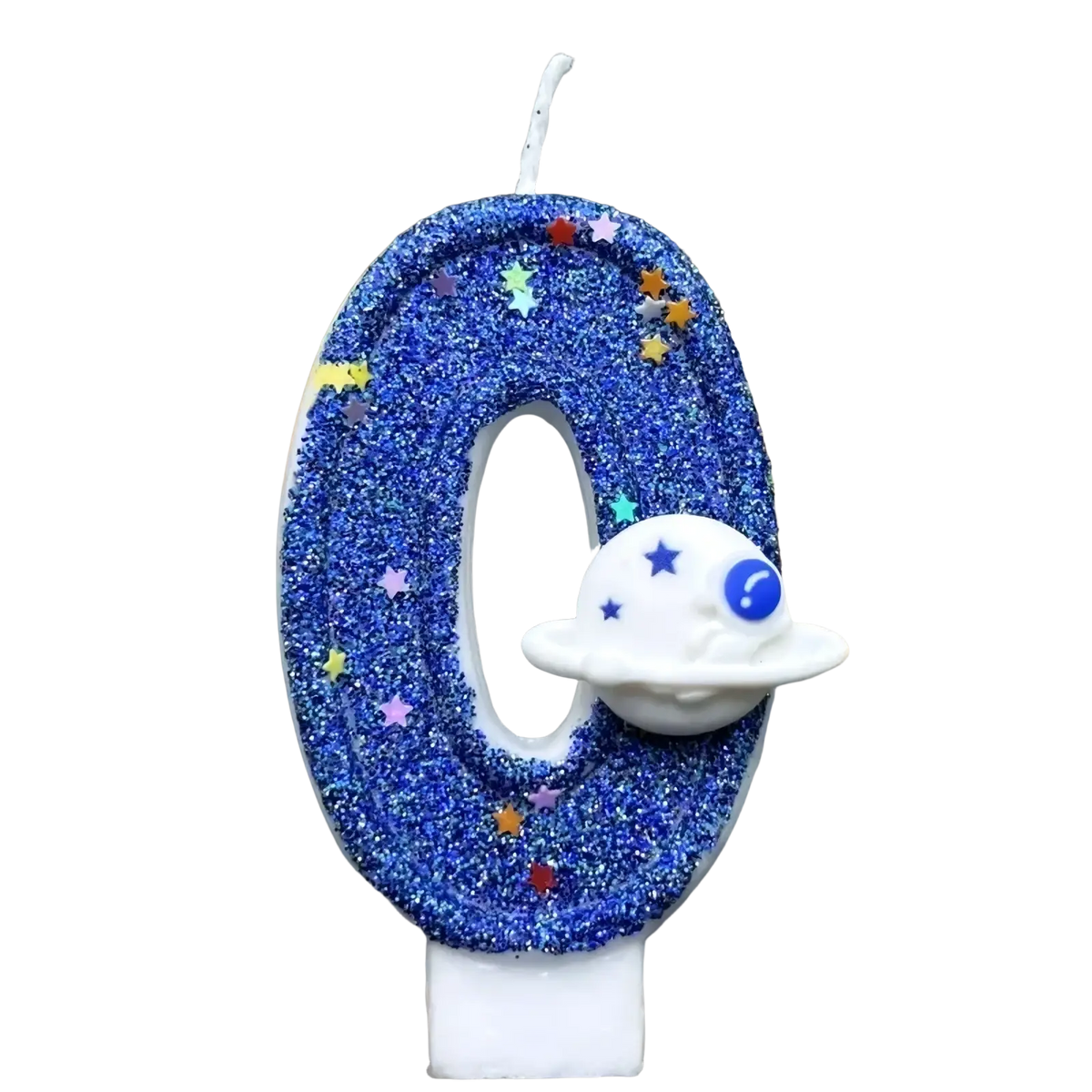 A blue glittery number zero birthday candle with colorful star sprinkles and a white planet figurine for space parties