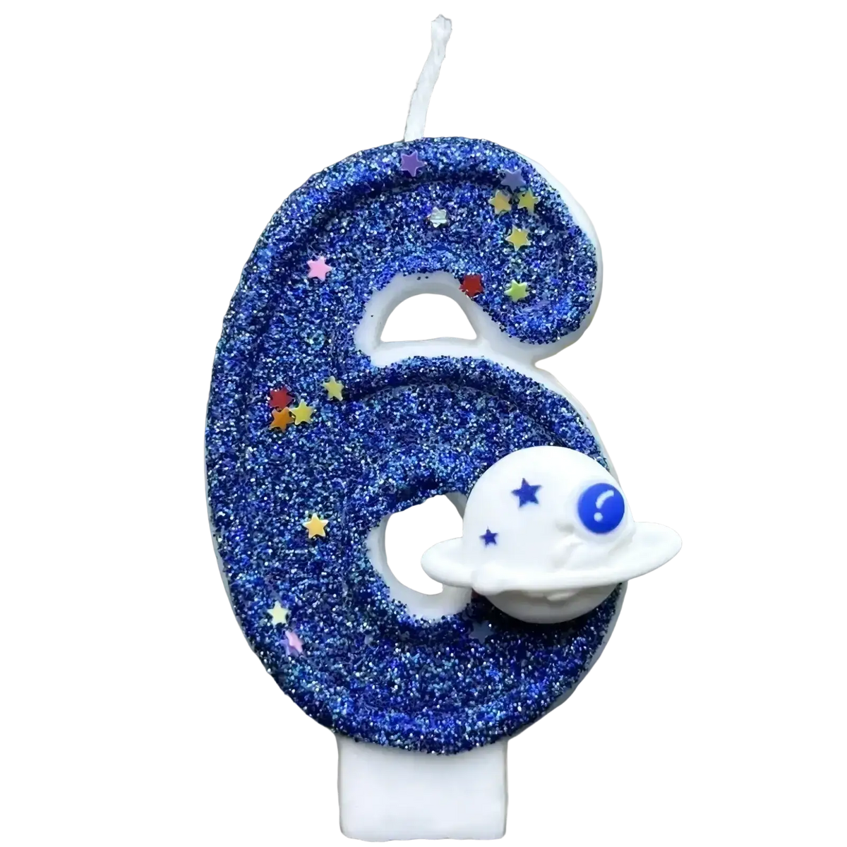 A blue glittery number six birthday candle with colorful star sprinkles and a white spaceship charm for a planetary party cake