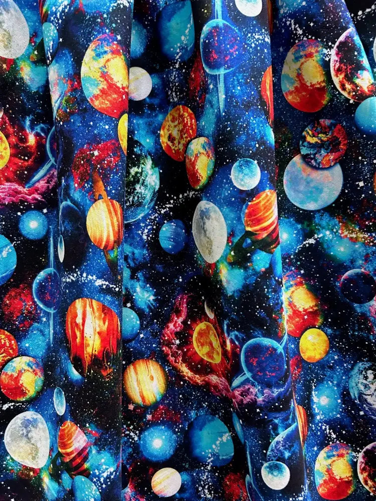 Space celestial print retro cotton doris skirt with pockets featuring a vibrant space-themed colorful planets and stars print
