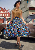 A vibrant full skirted space celestial print retro cotton doris skirt with pockets on a deep blue background