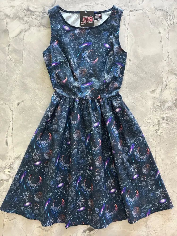 Navy celestial 1950s vintage sleeveless a-line cotton dress with cosmic moon planet star print and pockets