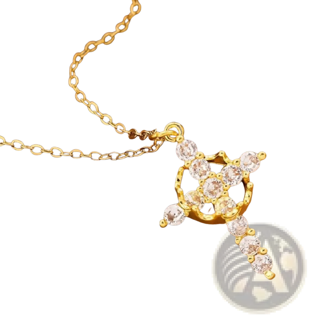 Gold-toned layered crown and cross pendant necklace adorned with clear sparkling cubic zirconia stones
