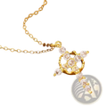 Gold-toned layered crown and cross pendant necklace adorned with clear sparkling cubic zirconia stones