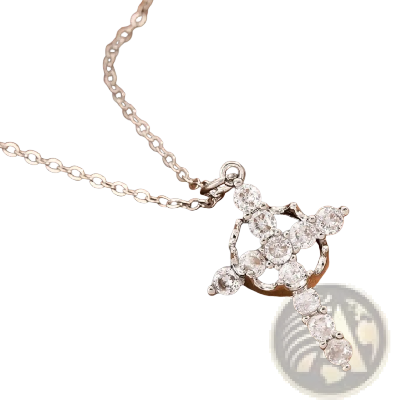 Sparkling layered crown and cross pendant necklace featuring a silver cross pendant with clear round-cut stones on a delicate chain