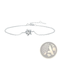 A delicate silver chain bracelet with a single sparkling round-cut moissanite diamond in a four-pronged clasp