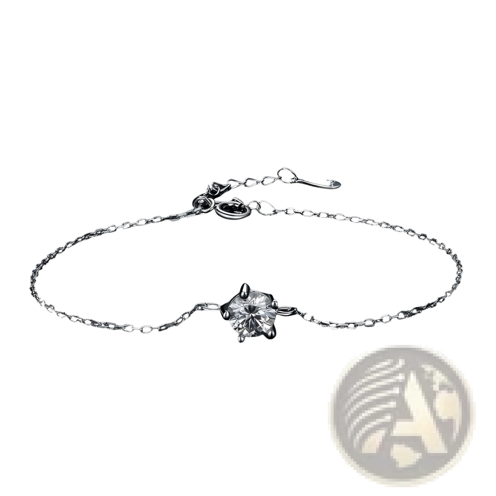 A delicate silver chain bracelet with a single sparkling round-cut moissanite gemstone centered on the band