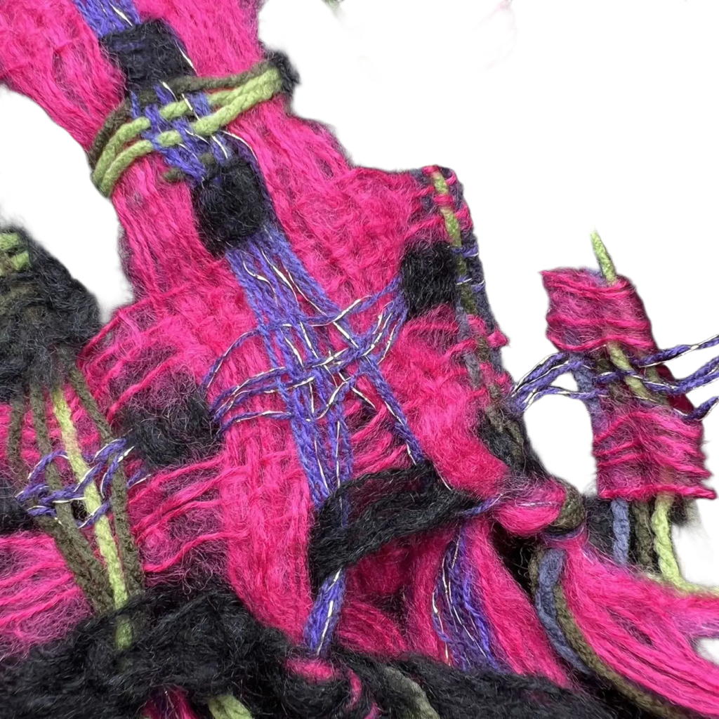 Sparkly metallic scarf for evening wear with vibrant pink black and green chunky knit yarn and metallic thread accents