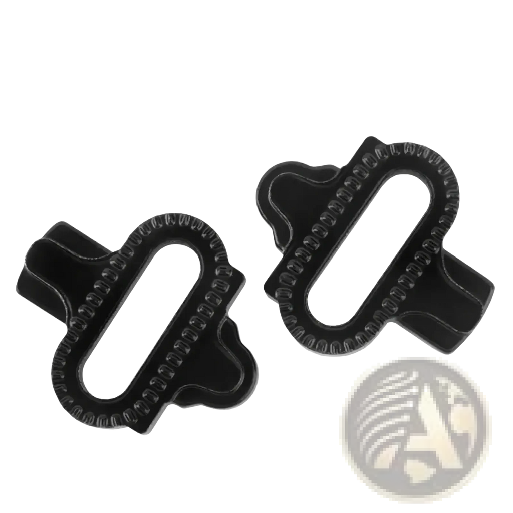 Black mountain bike brake pads with textured ridged surface and durable plastic construction for spd pedal cleats kit