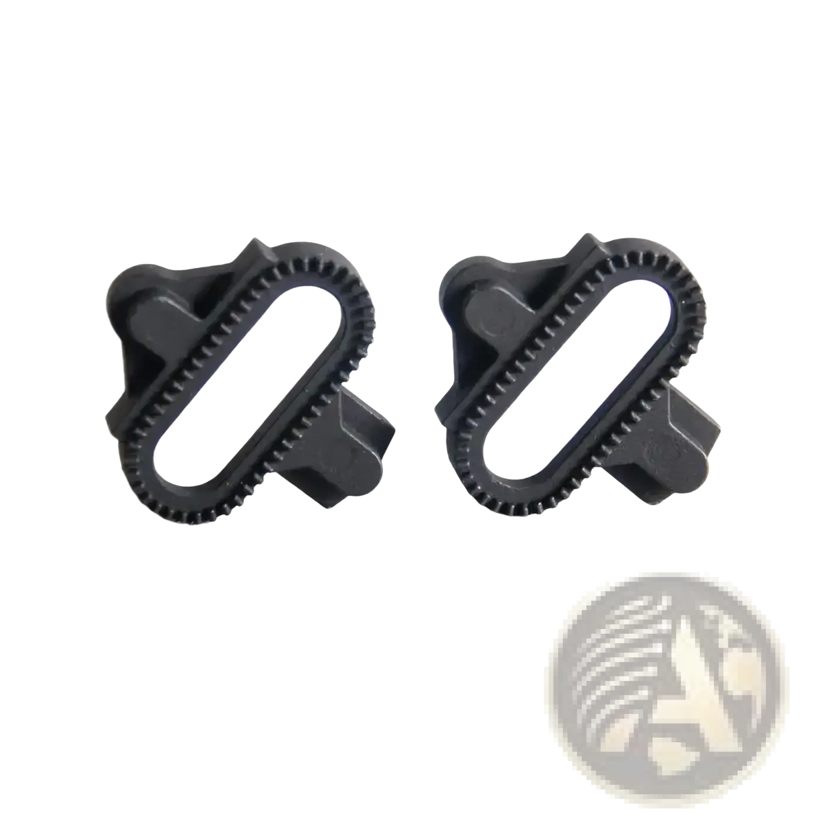 Black plastic mountain bike spd pedal cleats kit showing gear-like edges and central oval opening