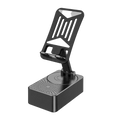 Black carbon fiber textured speaker phone stand with silver accents and perforated circular base cabinet material