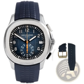 A sleek silver-toned specht & söhne luxury sport chronograph watch with dark blue rubber strap and orange hands