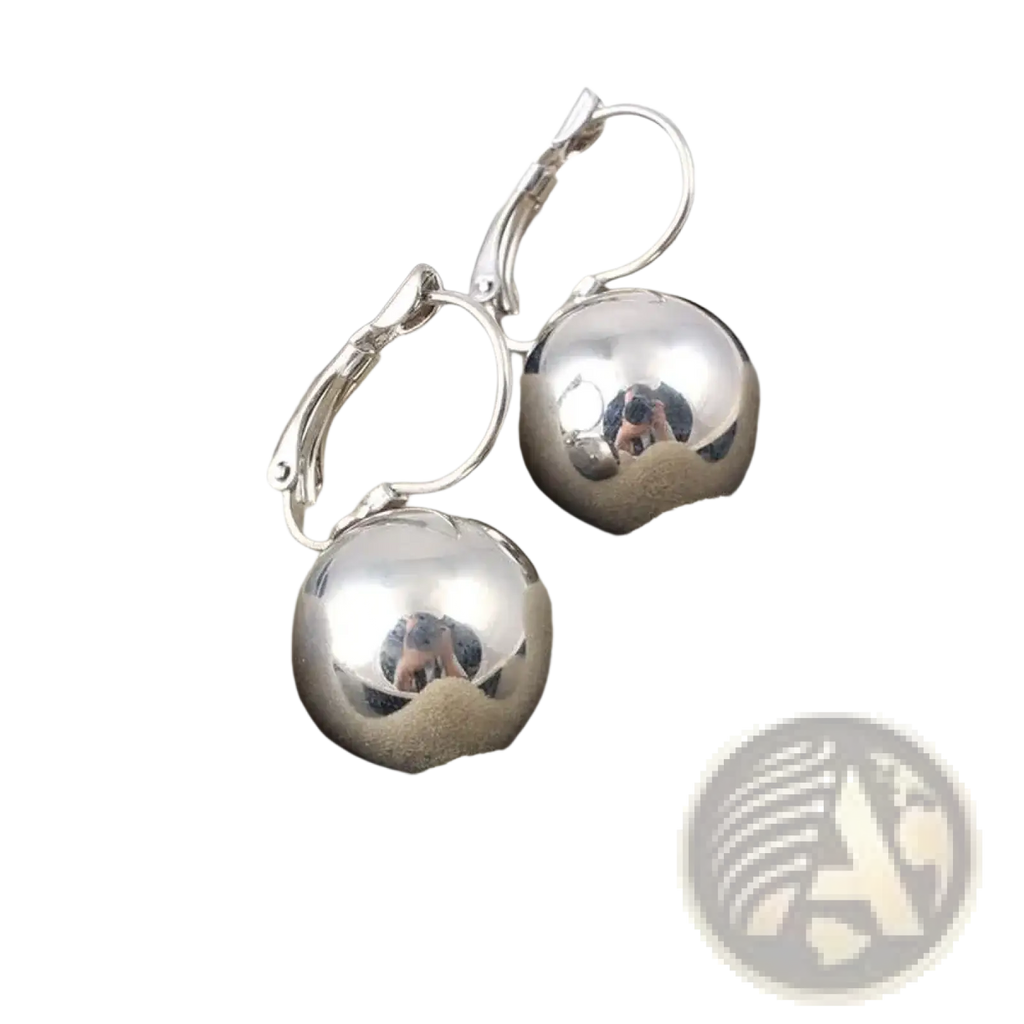 Shiny silver spherical ball dangle earrings with polished metallic finish and lever-back clasps