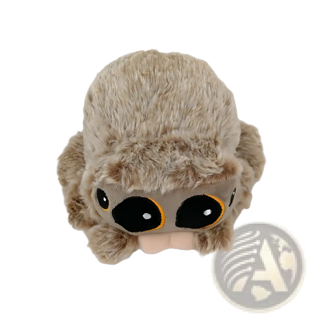 A fuzzy beige spider plush toy with large black eyes outlined in orange and a soft pink mouth 20cm tall