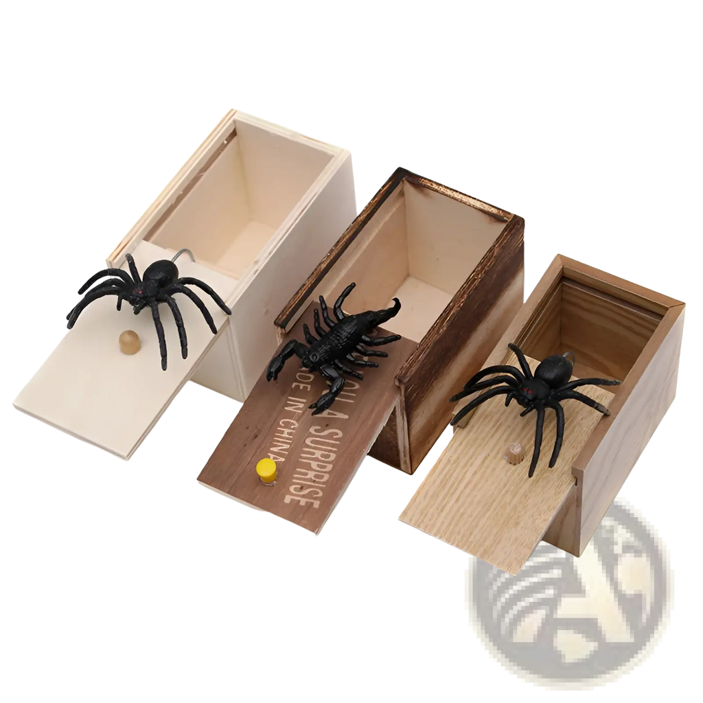Three wooden spider prank scare boxes with black plastic spiders and scorpions on lids for surprise tricks