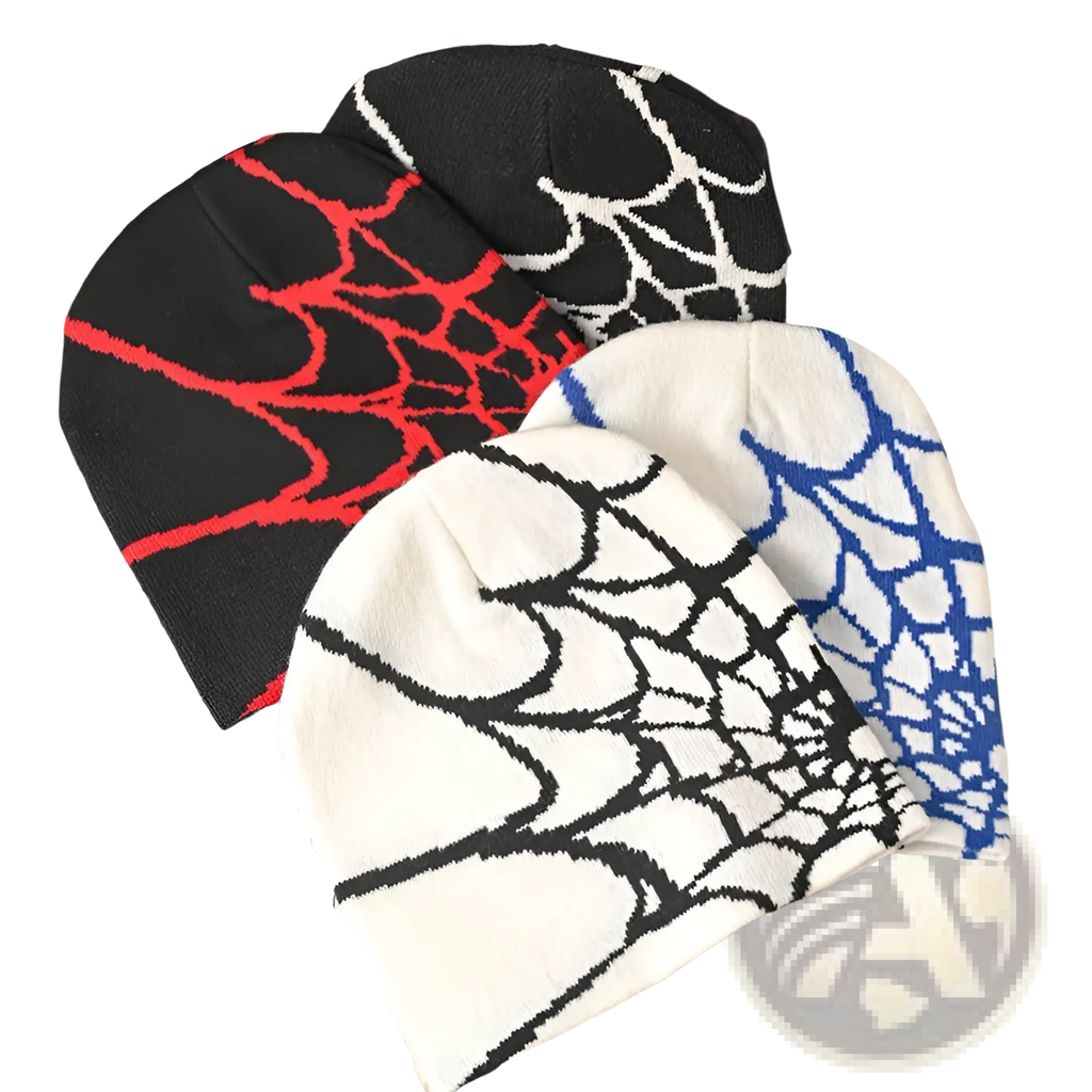 Three knitted Spiderweb knit beanie winter hats in black, red, and blue on contrasting backgrounds
