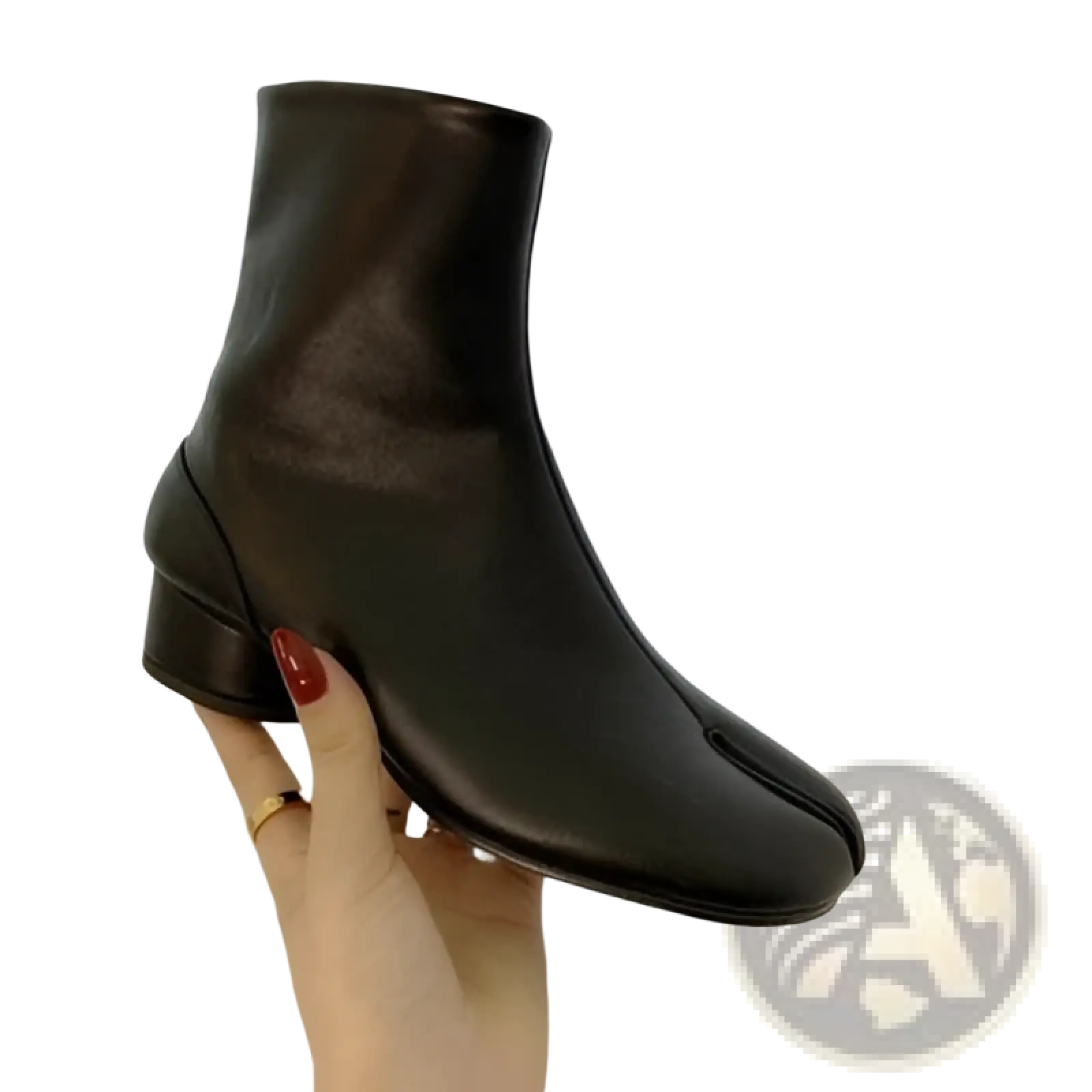 Black leather ankle boot with low block heel and distinctive japanese-style split toe seam in front view