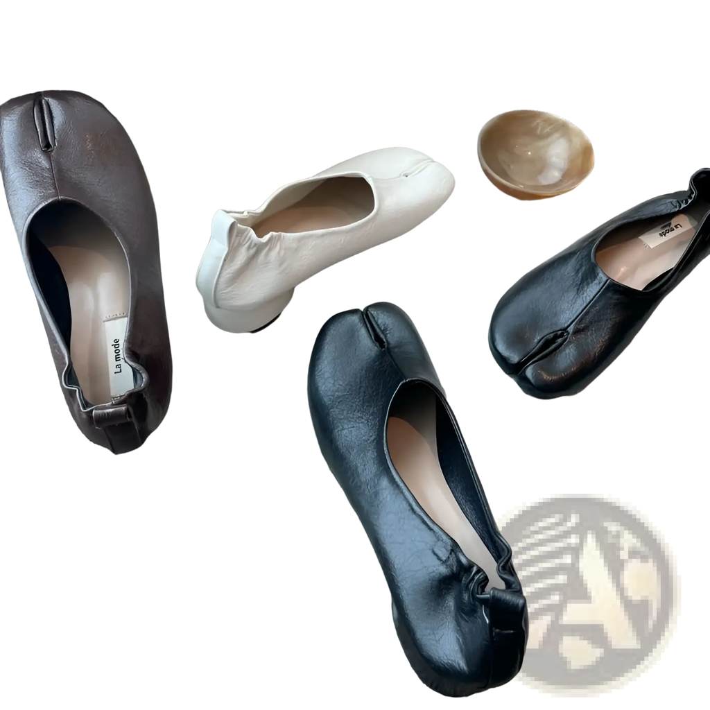 Black leather split toe tabi pumps with glossy finish and mid heel showcasing distinctive toe separation