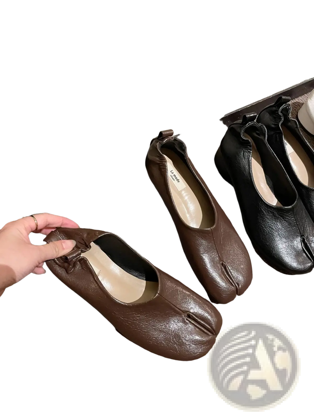 Brown leather split toe tabi flats with a soft matte finish and subtle stitching details mid heel horseshoe shoes
