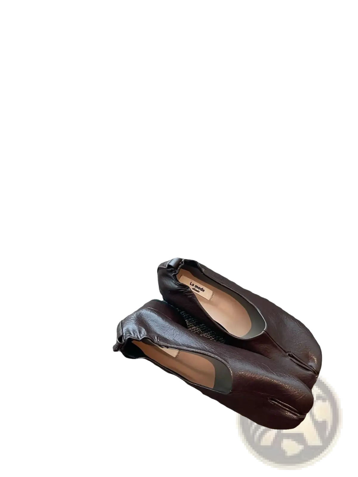 Dark brown leather split toe tabi moccasin-style flats with visible stitching and a soft textured finish