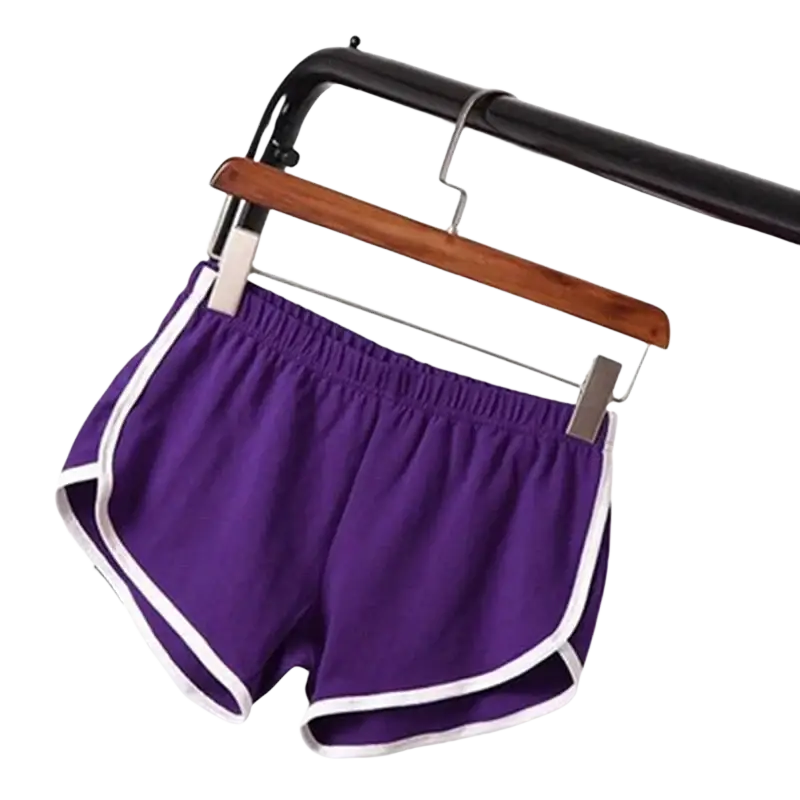 Purple sports shorts women with elastic waist and white trim designed for casual athletic use