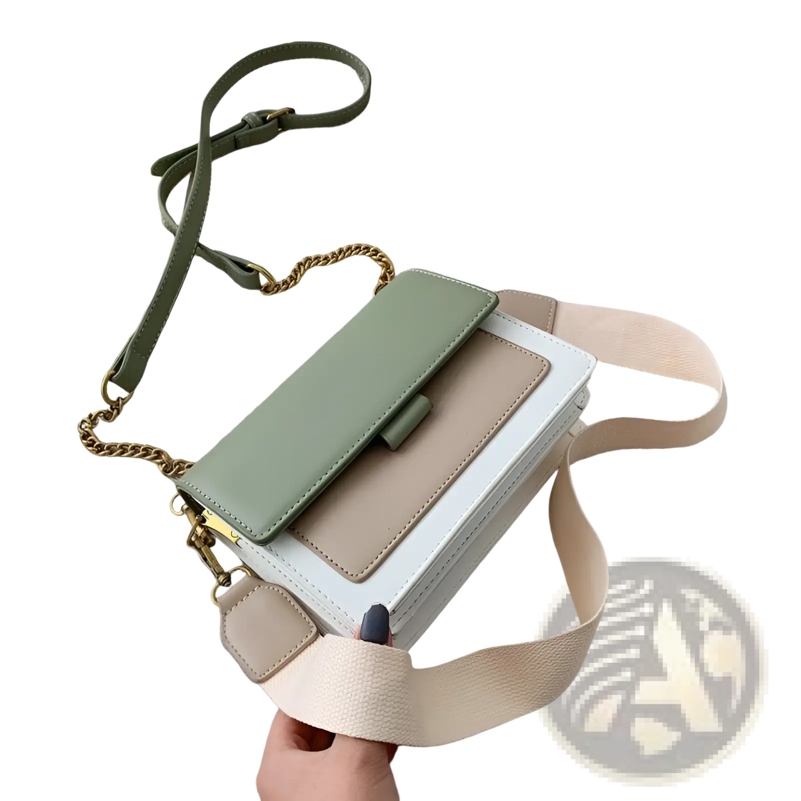 A stylish two-tone square crossbody bag in white, sage green, and beige faux leather with gold chain and adjustable straps