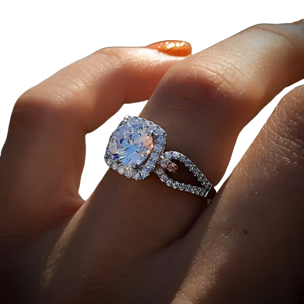 A square cut diamond halo engagement ring in silver with a sparkling center stone and a sleek metal band