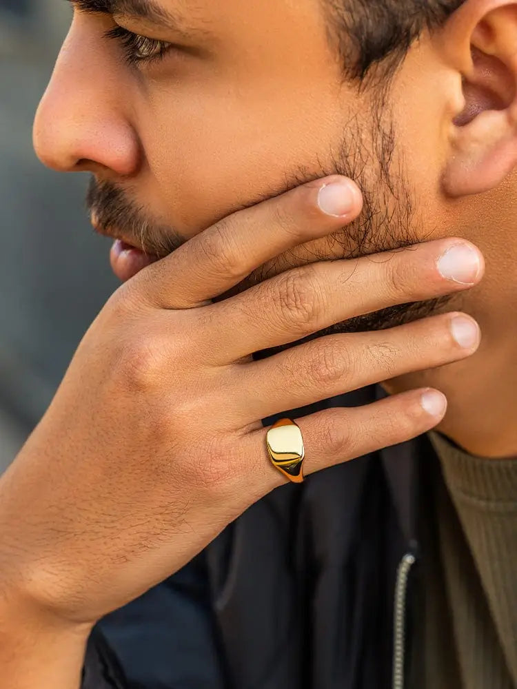 18k gold plated square signet ring for men with a smooth rectangular face and polished gold band