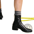 Black leather square toe ankle boots with low block heel and white contrast zipper on the inner side