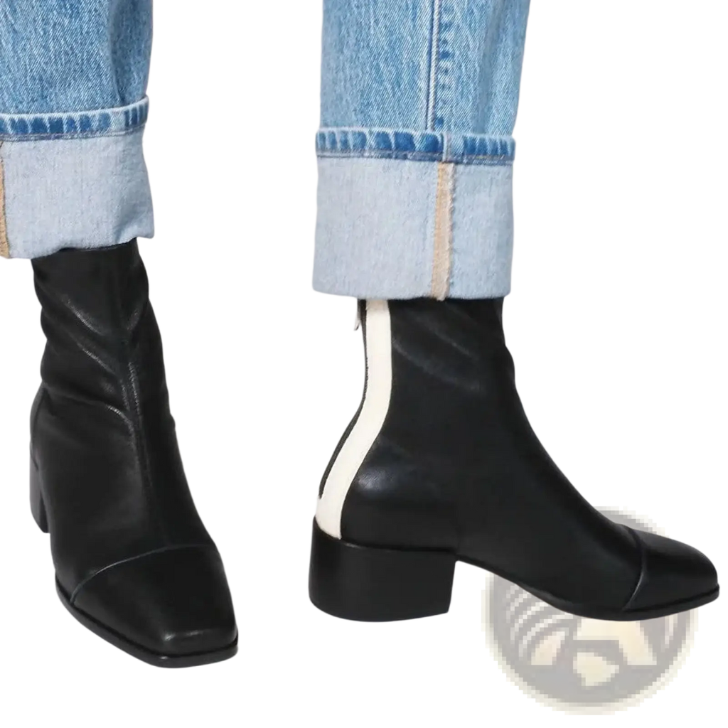 Black leather square toe ankle boots with white contrast zipper pull in a front view design