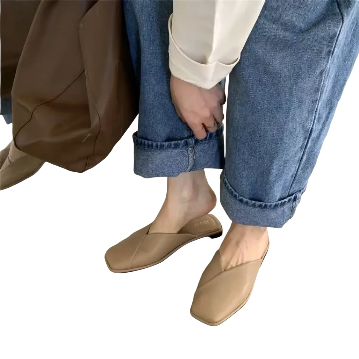 Beige square toe flat leather mules featuring a smooth leather minimalist design for elegant casual wear
