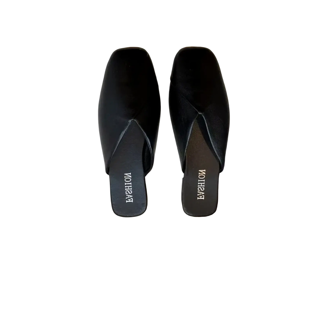 Black velvet square toe flat leather mules with a minimalist design ideal for elegant casual wear
