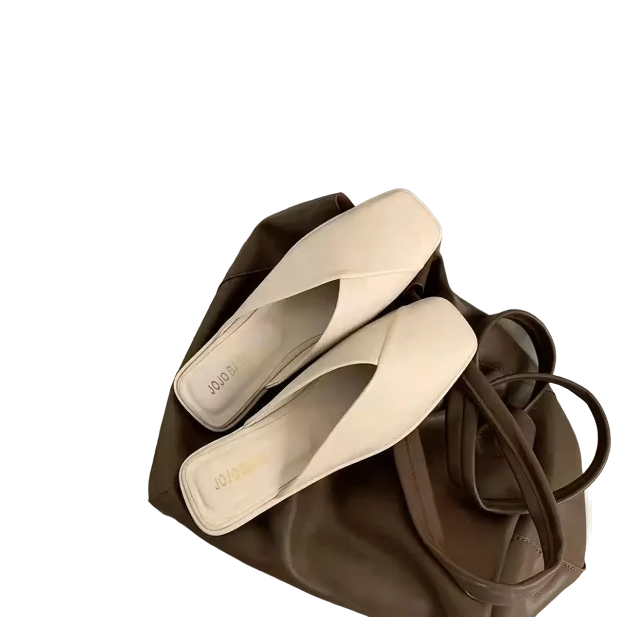 Beige square toe flat mules for women with a soft smooth leather finish and minimalist design for casual summer wear