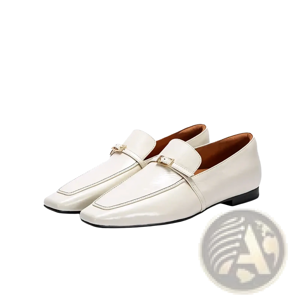 Cream-colored patent leather square toe loafers with gold-tone buckle accents for a stylish formal look