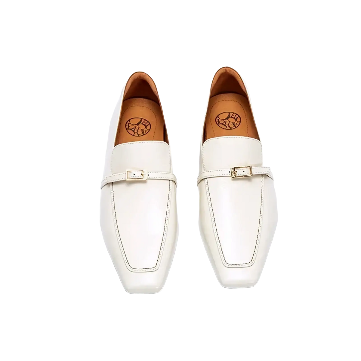 White leather square toe loafers with metallic buckle accents featuring a sleek and modern design