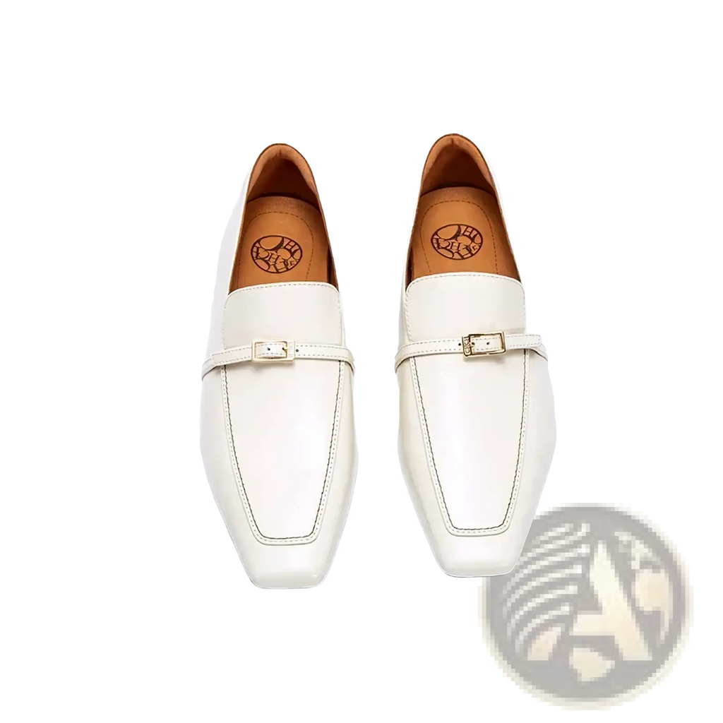White leather square toe loafers with metallic buckle accents featuring a sleek and modern design