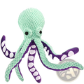 Squeaky octopus plush pet toy with textured fabric mint green body and purple tentacles with white spots