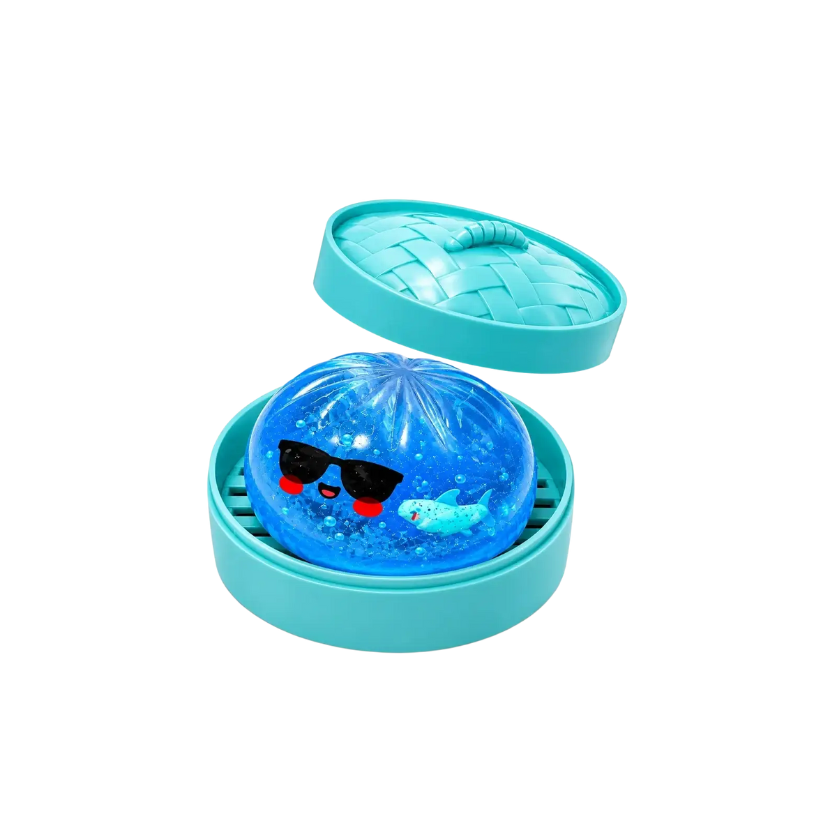 A translucent blue squishy dumpling stress ball with a cartoon shark design in a turquoise container finished goods