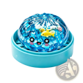 A translucent blue faceted spherical squishy dumpling stress relief toy with a cute cartoon face and miniature ocean creatures inside