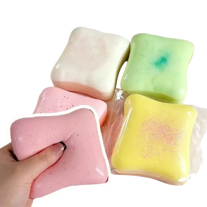 Pink squishy toast stress relief toy macaron color with a smooth slightly speckled surface for stress reduction