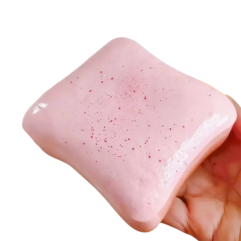 Pink square-shaped glossy slime with red speckles in squishy toast stress relief toy macaron color design