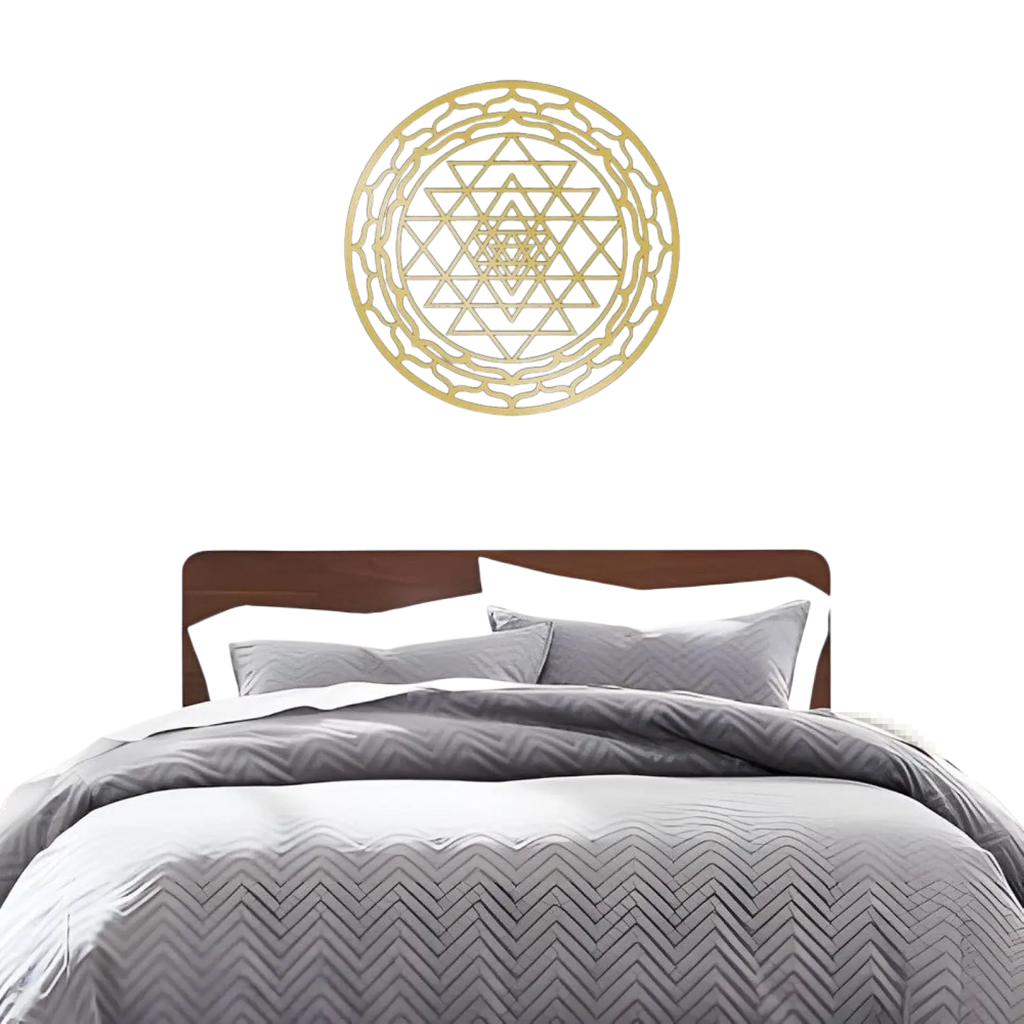 Gold-colored metallic sri yantra wall art with intricate geometric patterns for sacred geometry decor