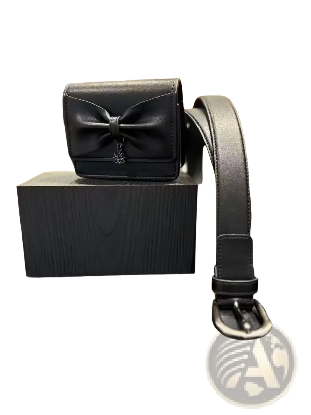 Black leather St Andrews women waist bag with prominent bow detail and small dangling charm solid nylon fanny pack
