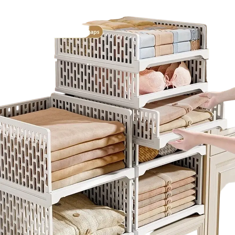 White plastic stackable wardrobe drawer units with lattice design for folding storage and organized closet use