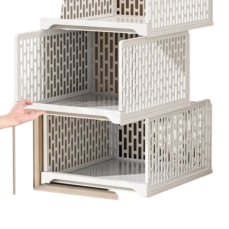 White plastic stackable wardrobe drawer units with perforated design for folding storage and organizing clothes