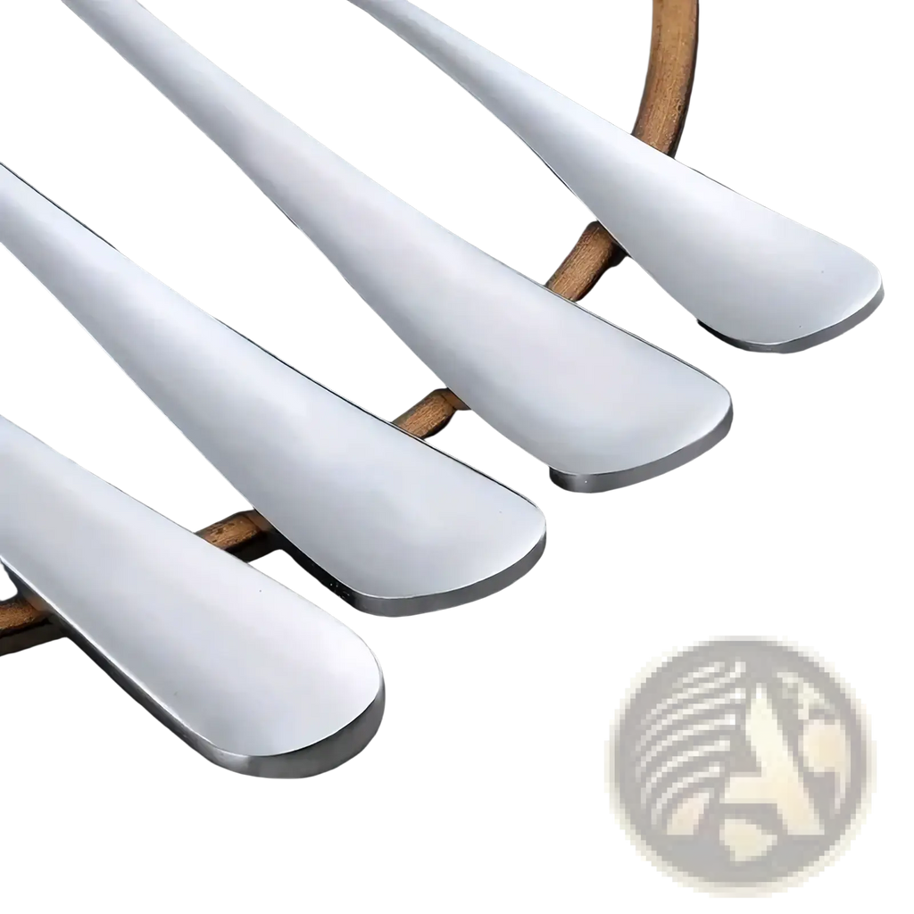 Set of four sleek modern stainless steel spoons with polished handles in a 16-piece cutlery set