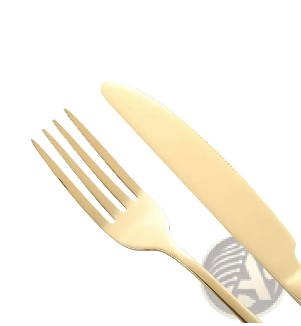 Gold-finished stainless steel fork and knife from a stainless steel 4-piece flatware set for elegant dining use